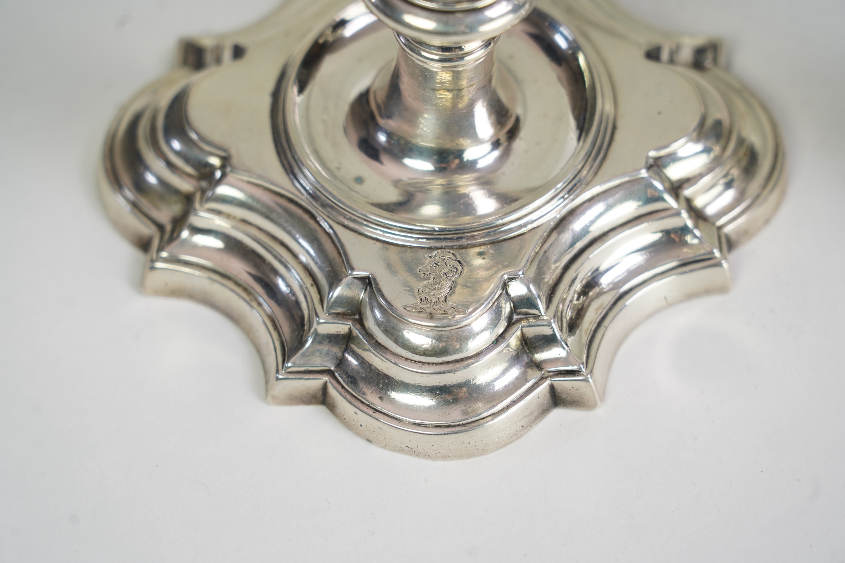 A pair of George II cast silver candlesticks, by Susannah Hatfield